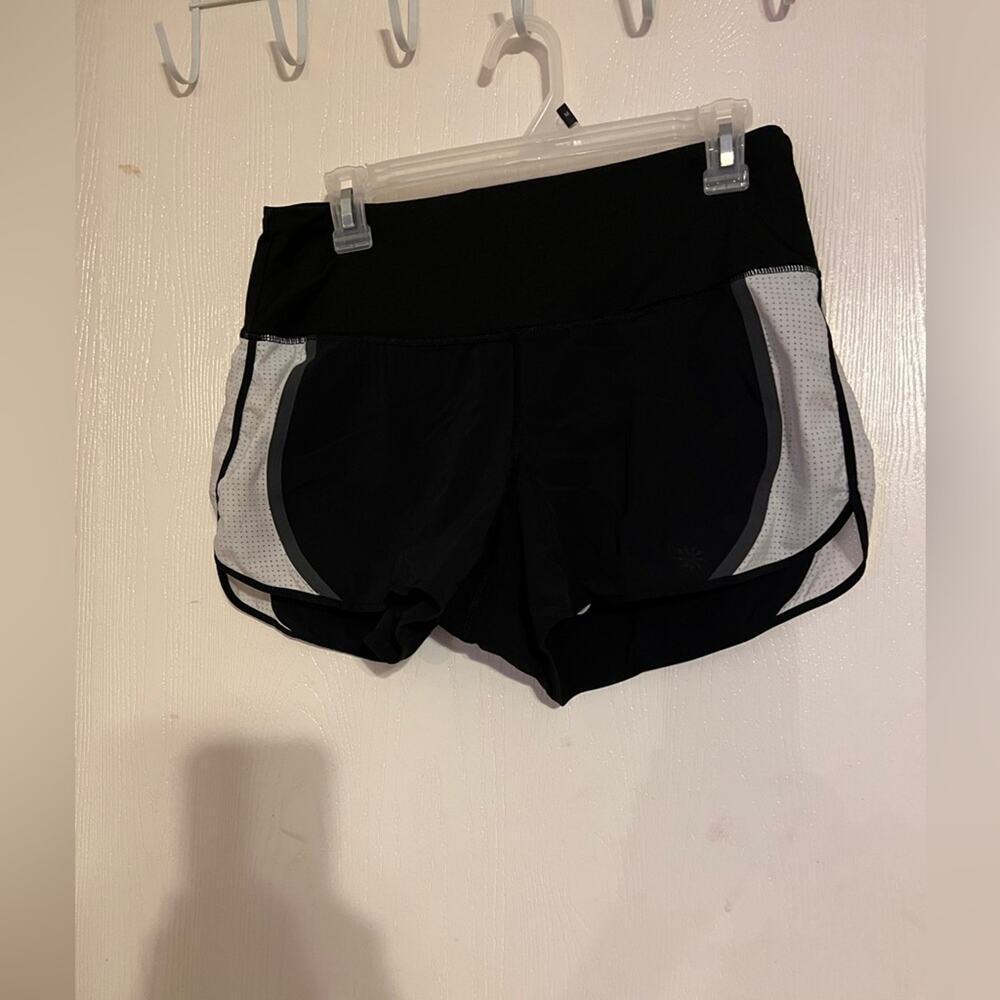 Athleta race runner shorts black white mesh accents zipper pocket size s
